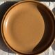 11 assiettes à dessert en grès liseré brun Sarreguemines