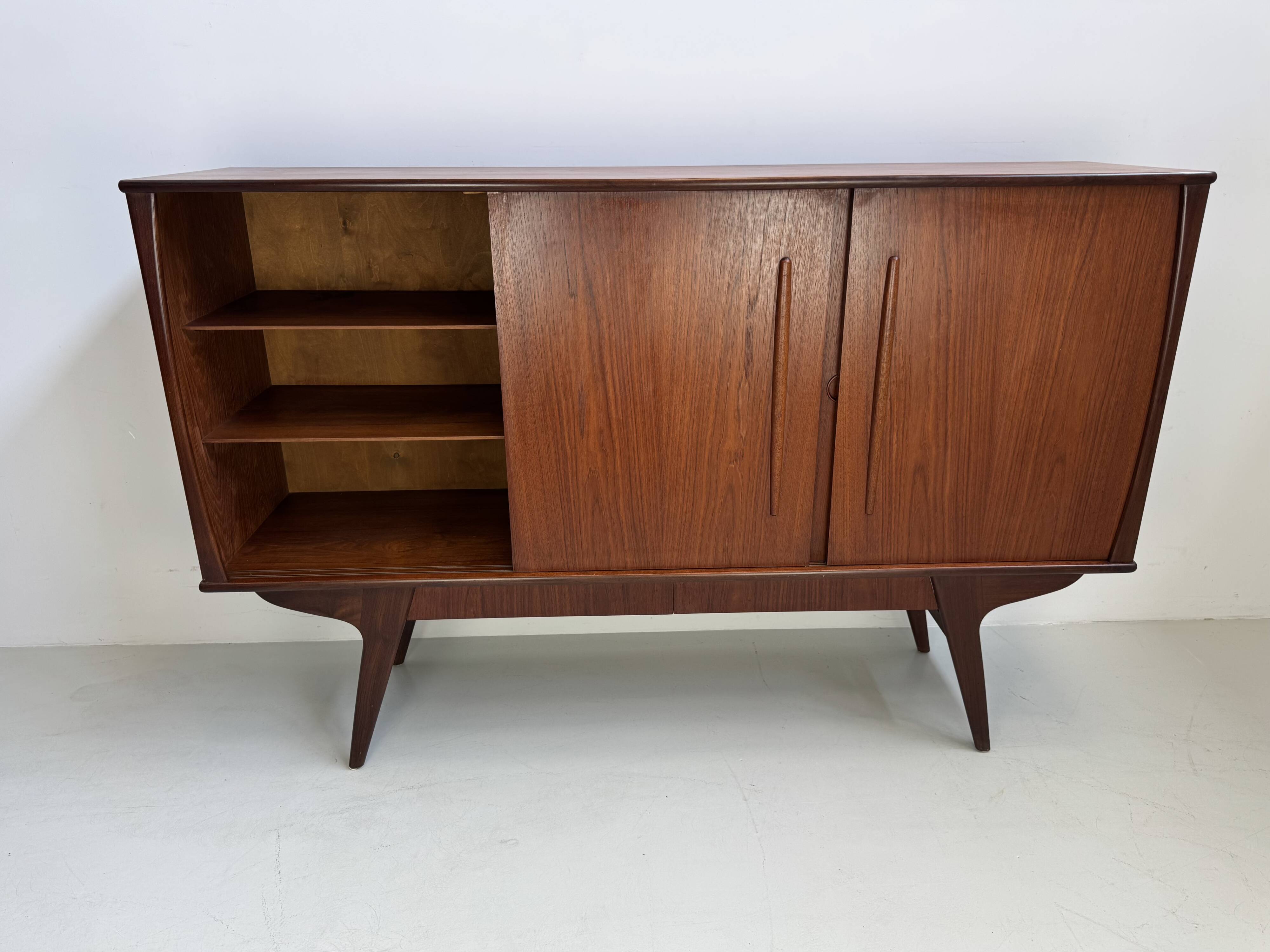 Vintage Danish teak wall unit with sliding doors from the 1960s.