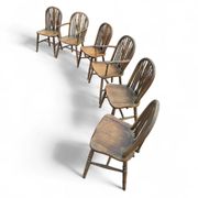 A slightly weathered Windsor wheelback dining set (7) by Oirschotse Meubelindustrie 1950s