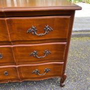 Commode arbalète Louis XV en bois massif merisier du 20ème