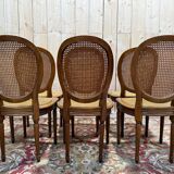 Set of 6 Louis XVI medallion chairs with caning.