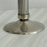 Patinated metal candle holder with knot