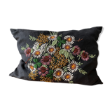 Embroidered black linen cushion