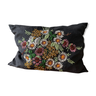 Embroidered black linen cushion