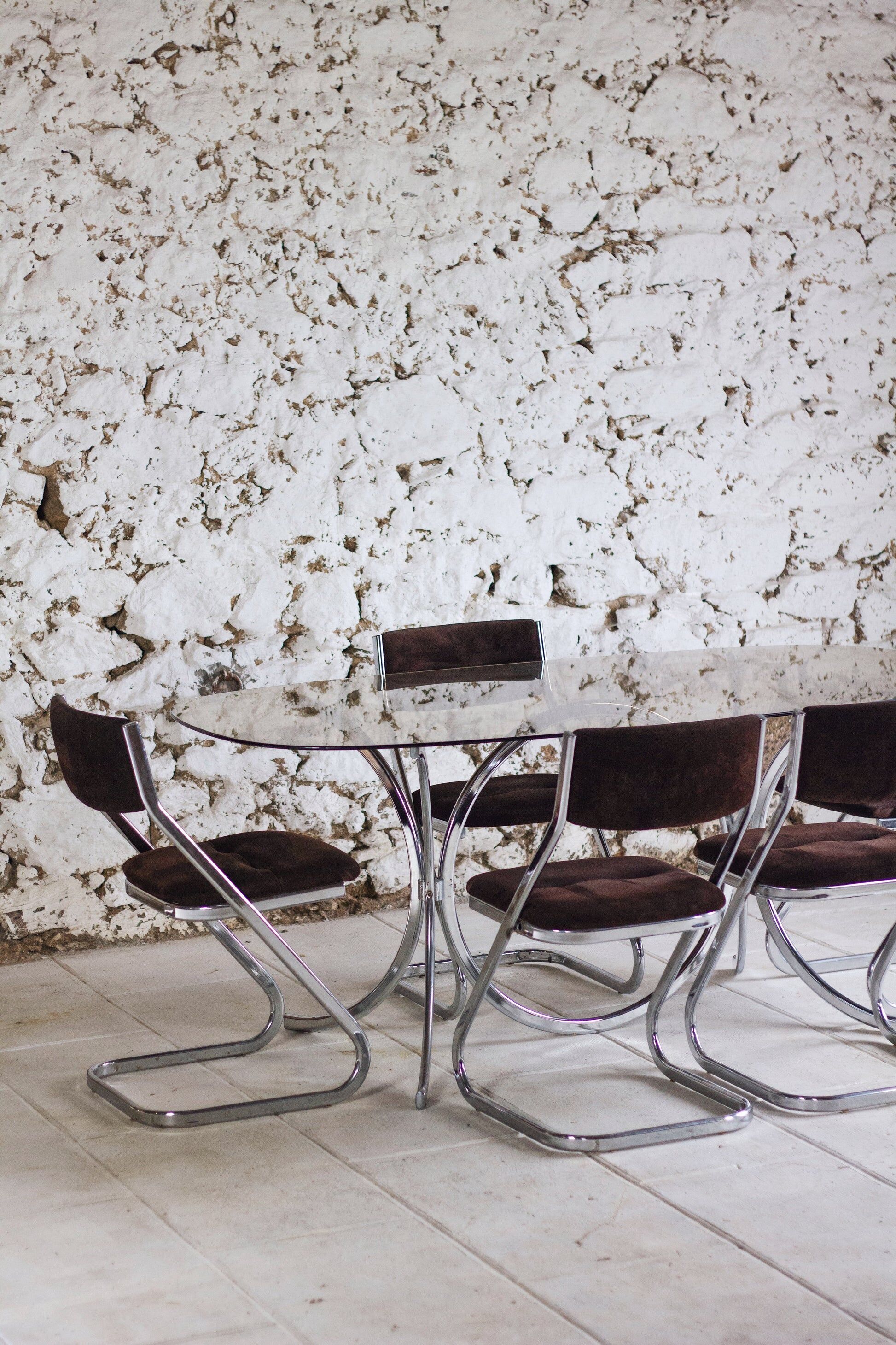Chrome and smoked glass dining table in the style of Gastone Rinaldi, 1970.