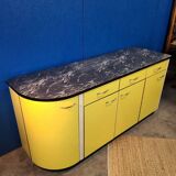 Vintage yellow sideboard, and black marble top.
