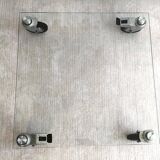 Beautiful designer glass coffee table on wheels