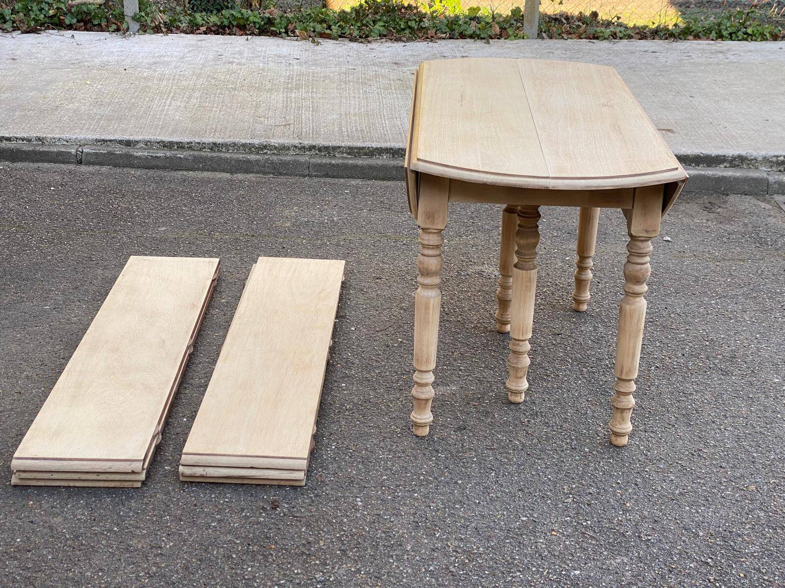 Renovated round extendable dining table with flaps, 6 extensions, 300cm.