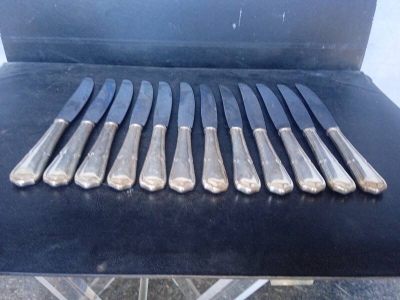 12 knives + silver metal punch from the 1950s