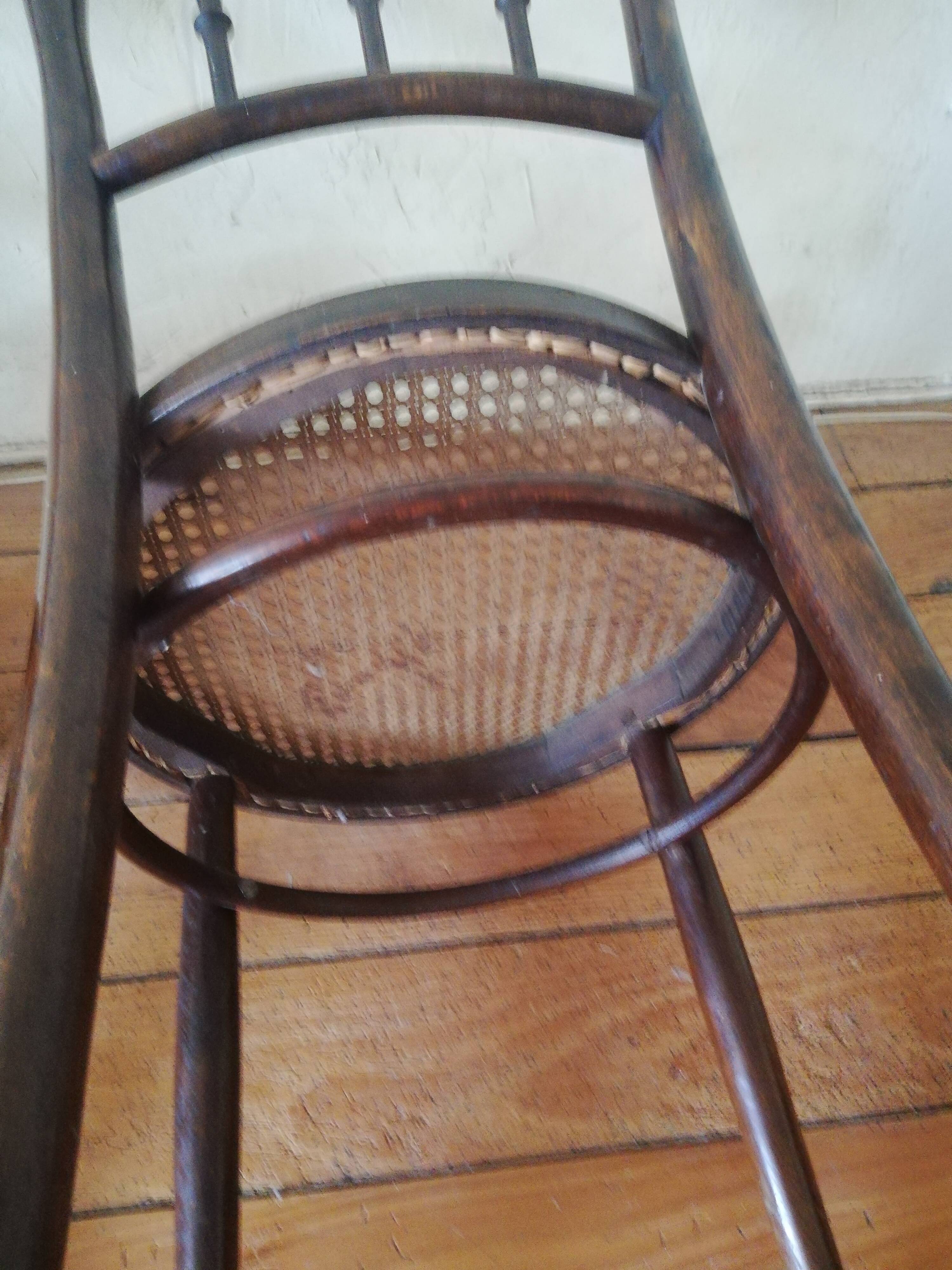 Old curved wooden bistro chairs