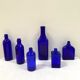 Set of 6 cobalt blue glass pharmacy bottles