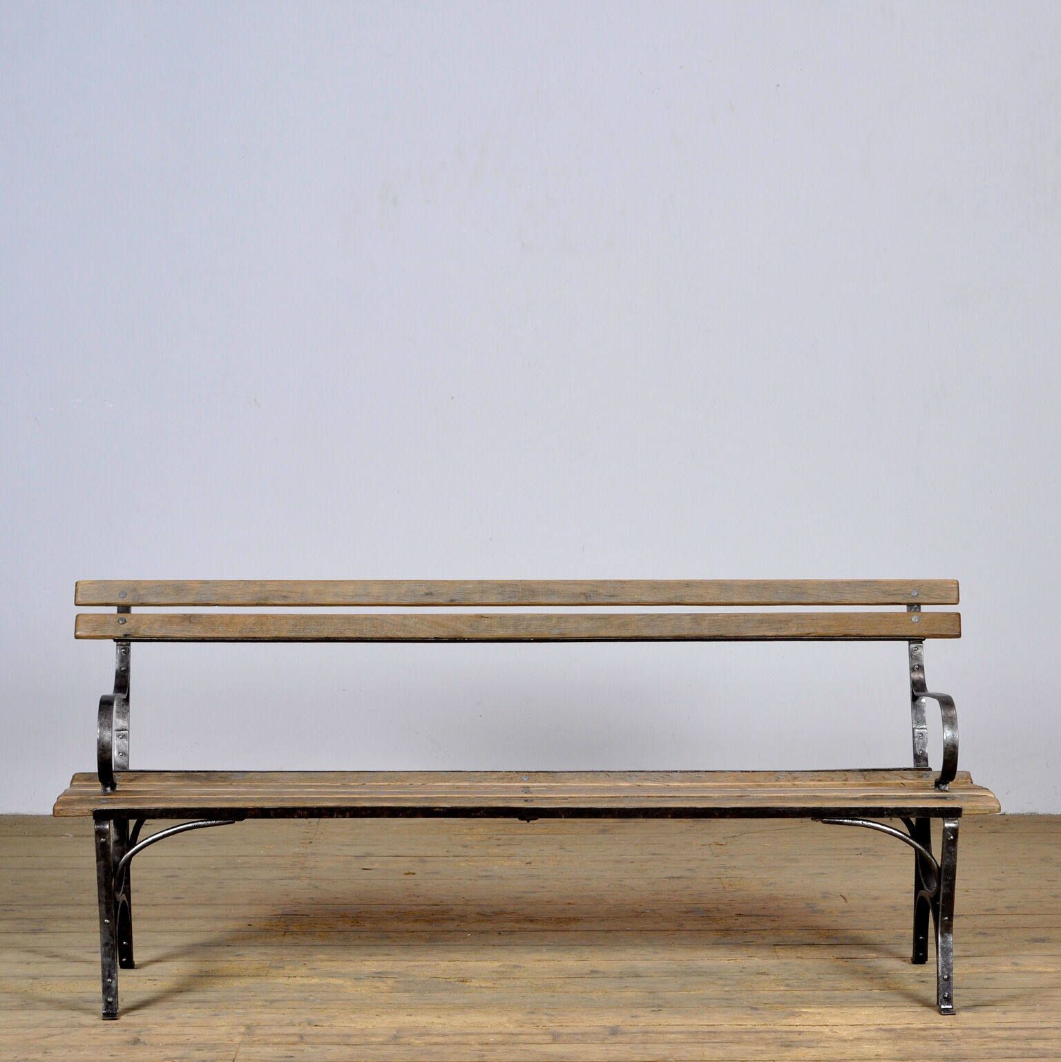 Riveted iron park bench 1920s