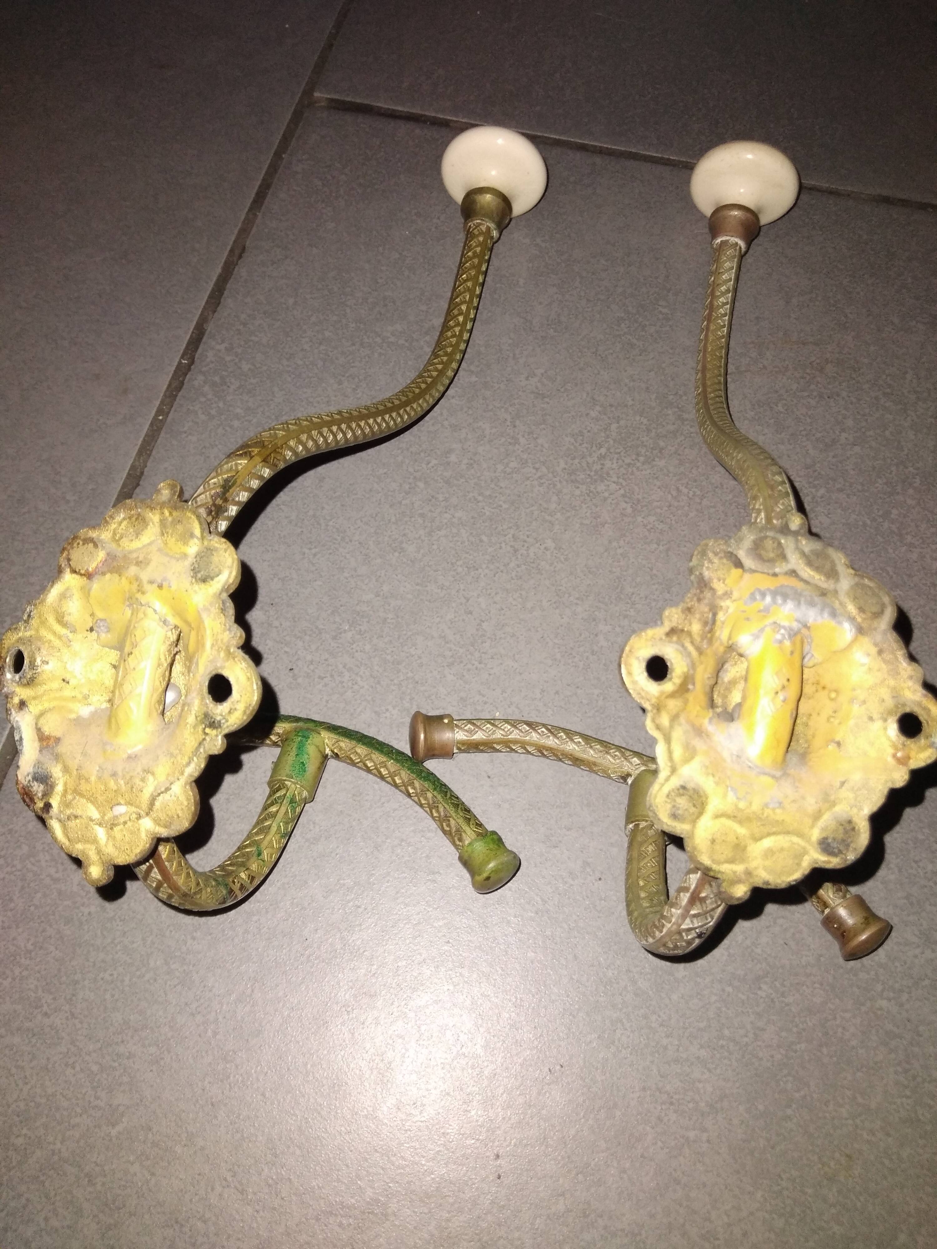 Antique metal and ceramic hooks