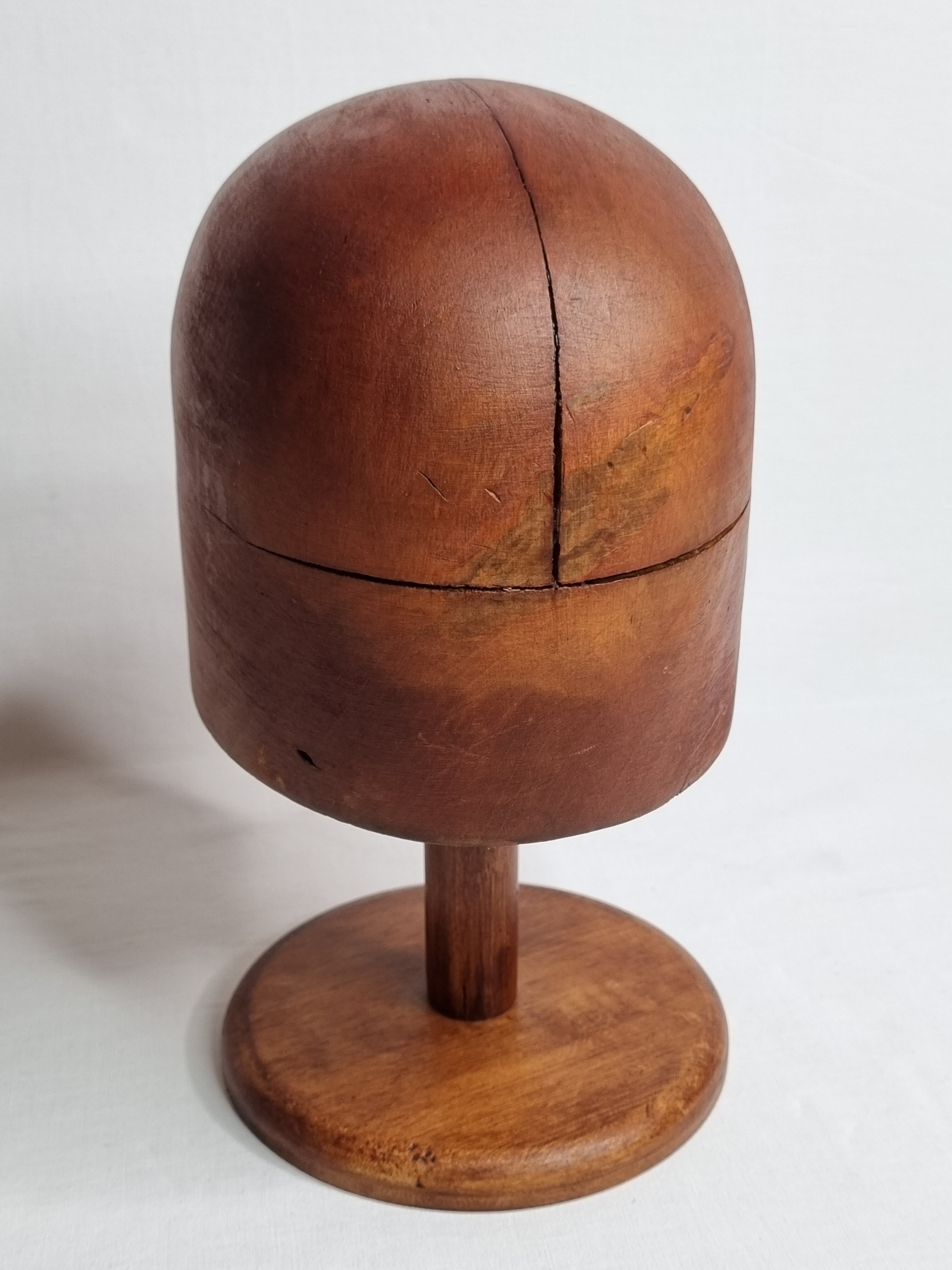 Old wooden hat shape on foot, 1900
