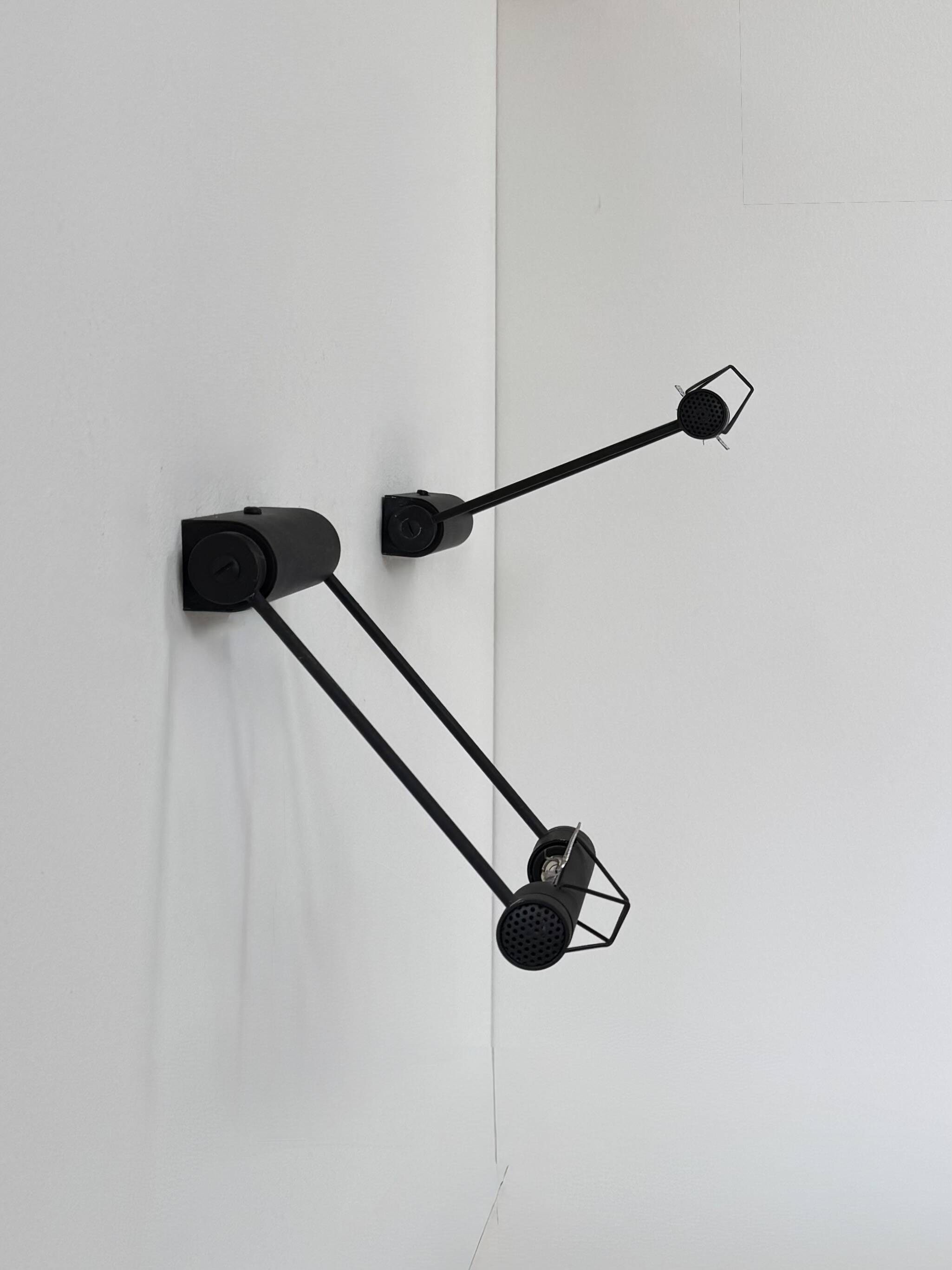 Pair of adjustable vintage wall lights, matte black metal, Italy, 1980.