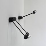 Pair of adjustable vintage wall lights, matte black metal, Italy, 1980.