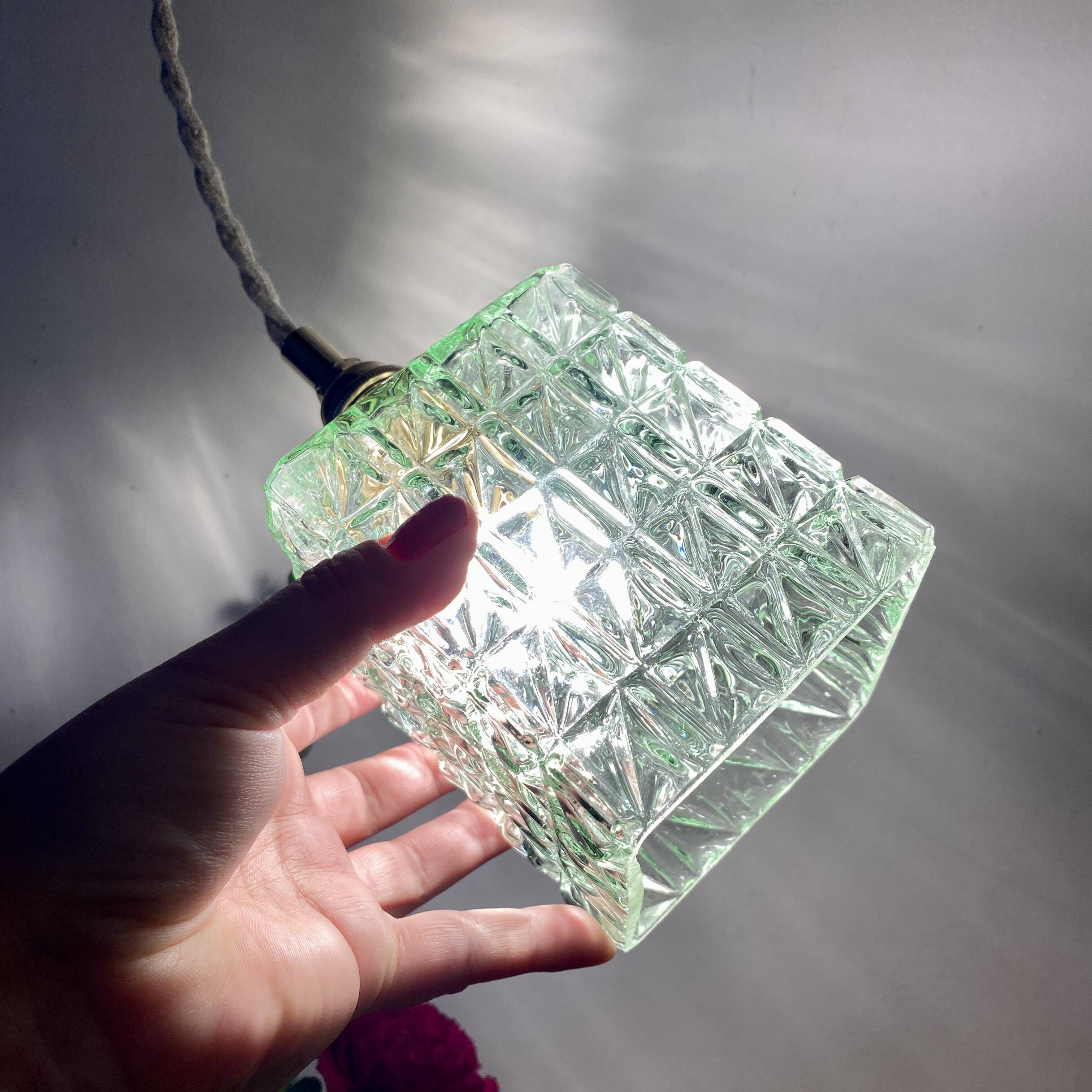 Vintage globe pendant light in green molded glass