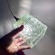 Vintage globe pendant light in green molded glass