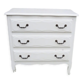 Old chest of drawers in white wood