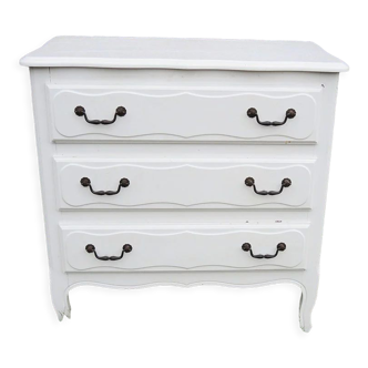 Old chest of drawers in white wood
