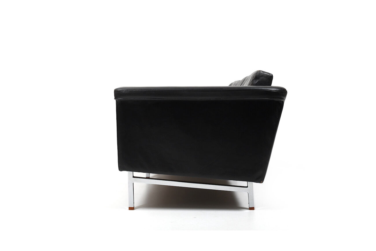 Danish leather sofa with chrome legs and teak ends