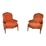Pair of transitional carved wooden armchairs, 18th century
