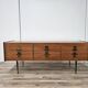 1960s walnut chest of drawers with iron and brass details