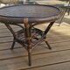 Round vintage coffee table in bombous and rattan