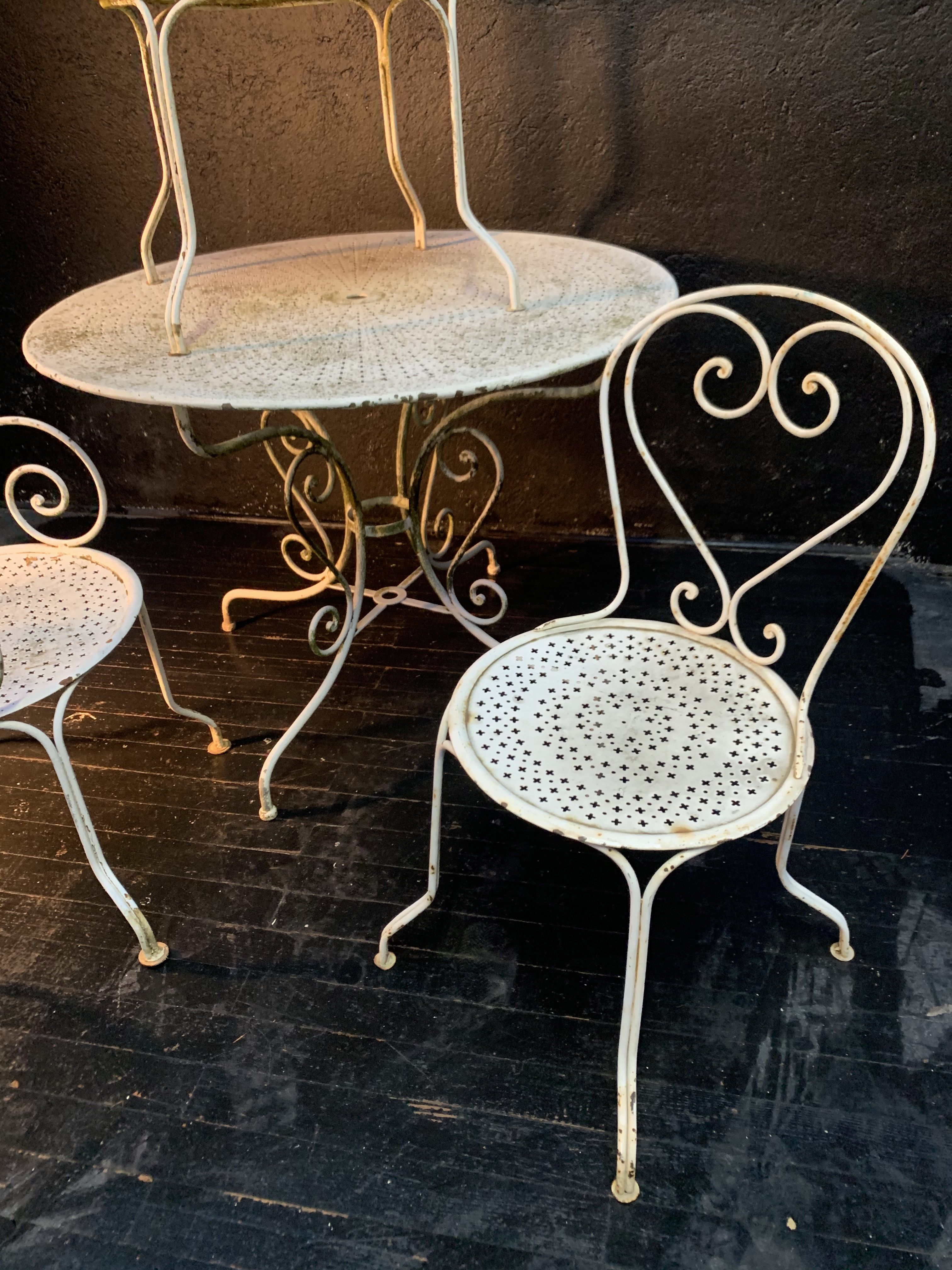 Set of wrought iron garden furniture
