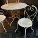 Set of wrought iron garden furniture