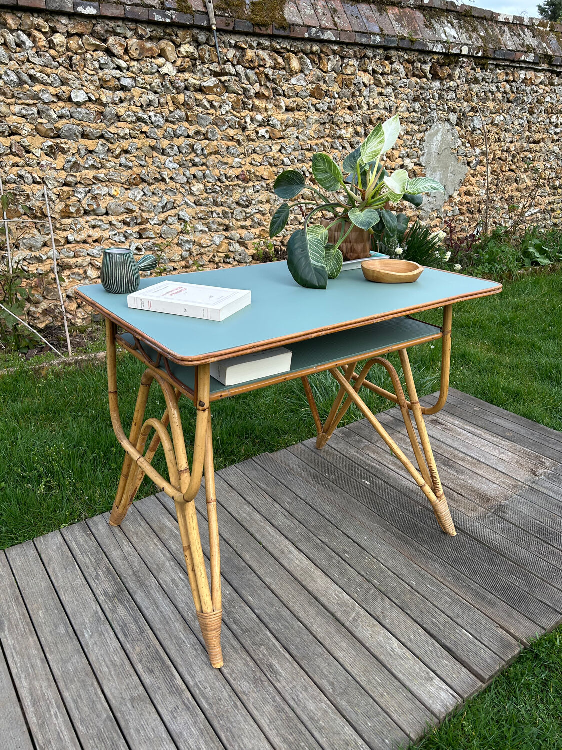 Small vintage rattan desk from the 1960s.