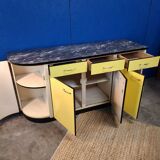 Vintage yellow sideboard, and black marble top.