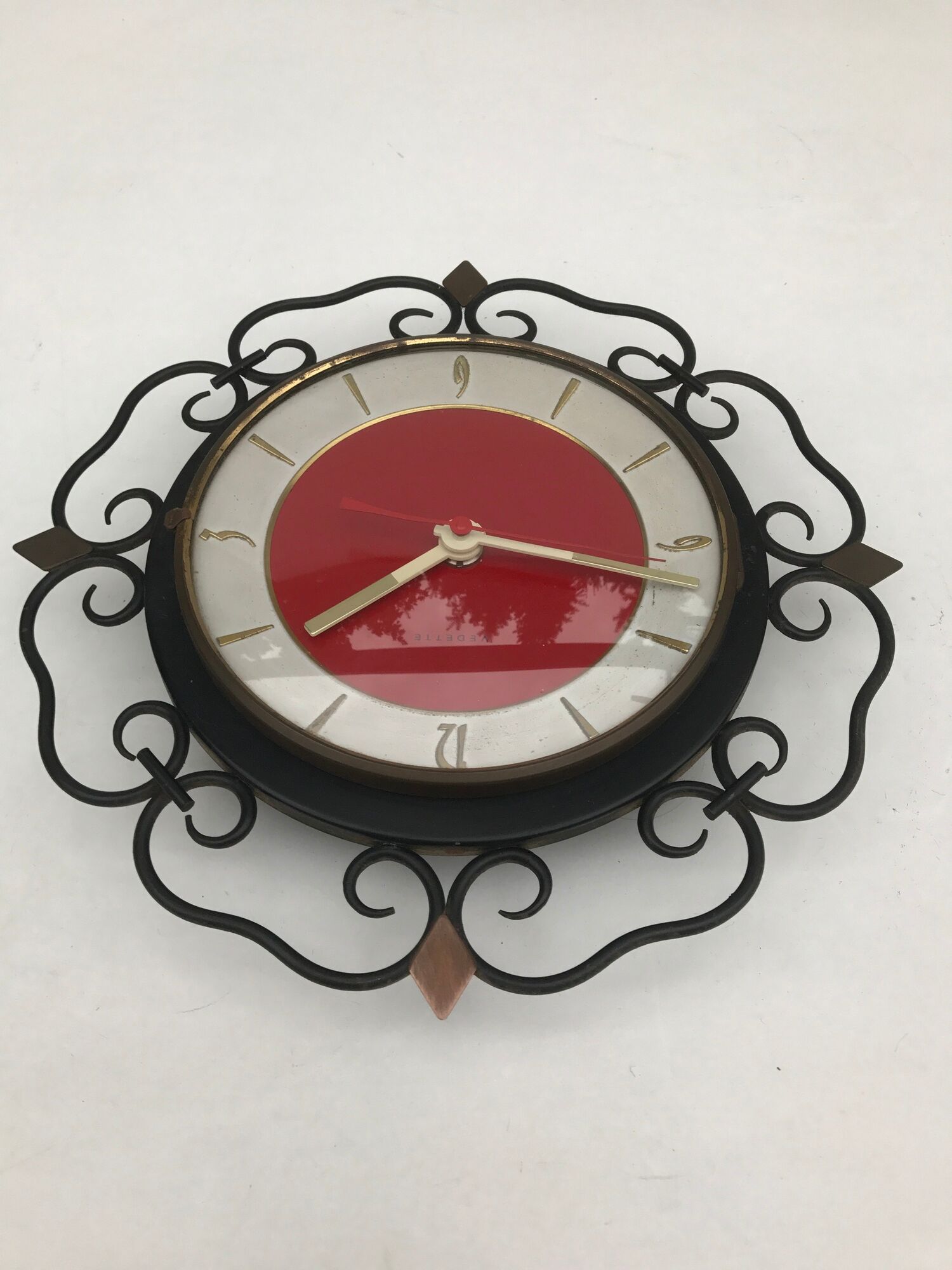Pendulum clock old featured in metal and vintage copper spikes