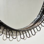Metal framed mirror