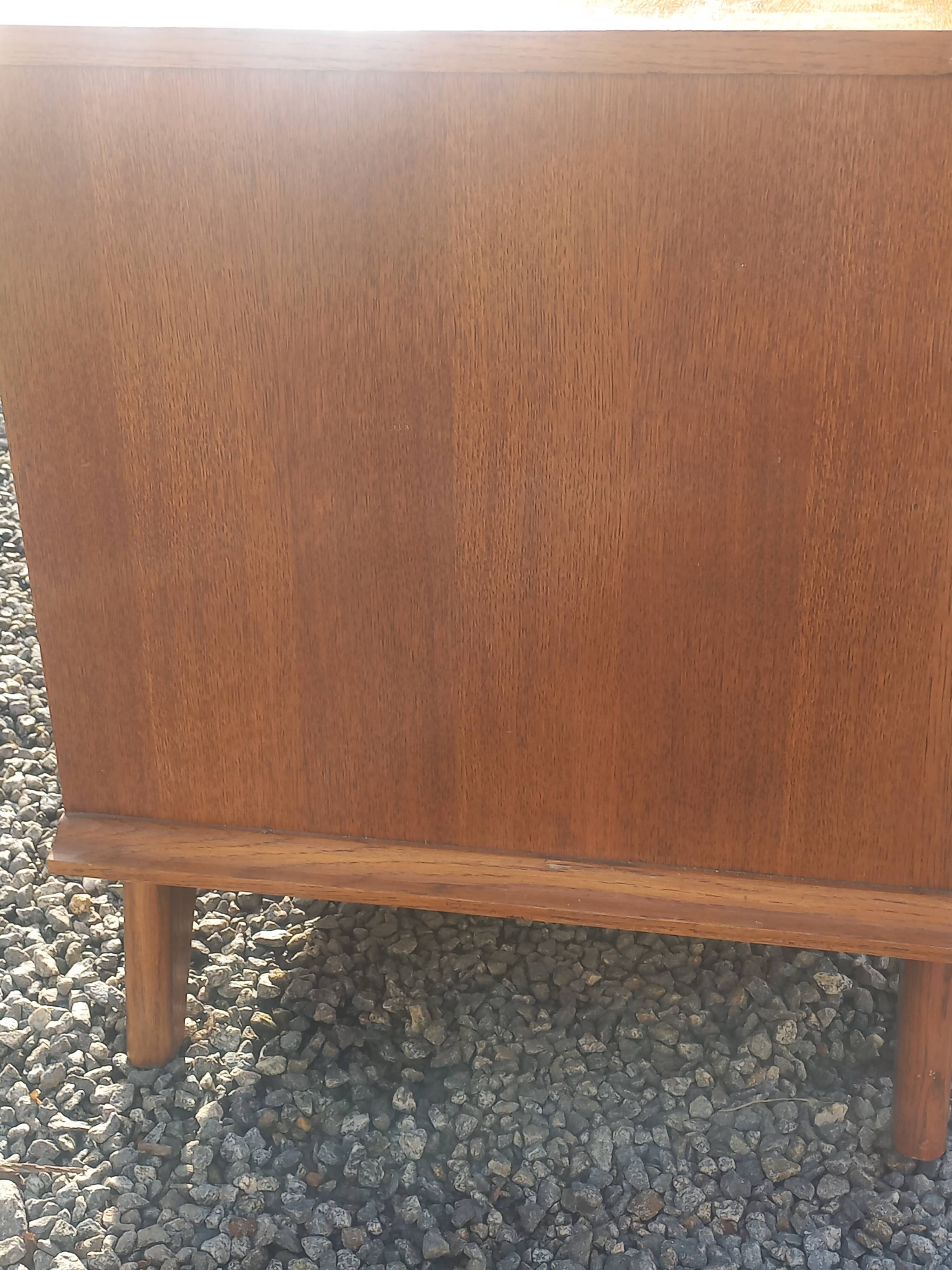 Vintage oak sideboard with splayed legs from the 1950s.