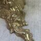 Small wall console in Rococo style in bronze