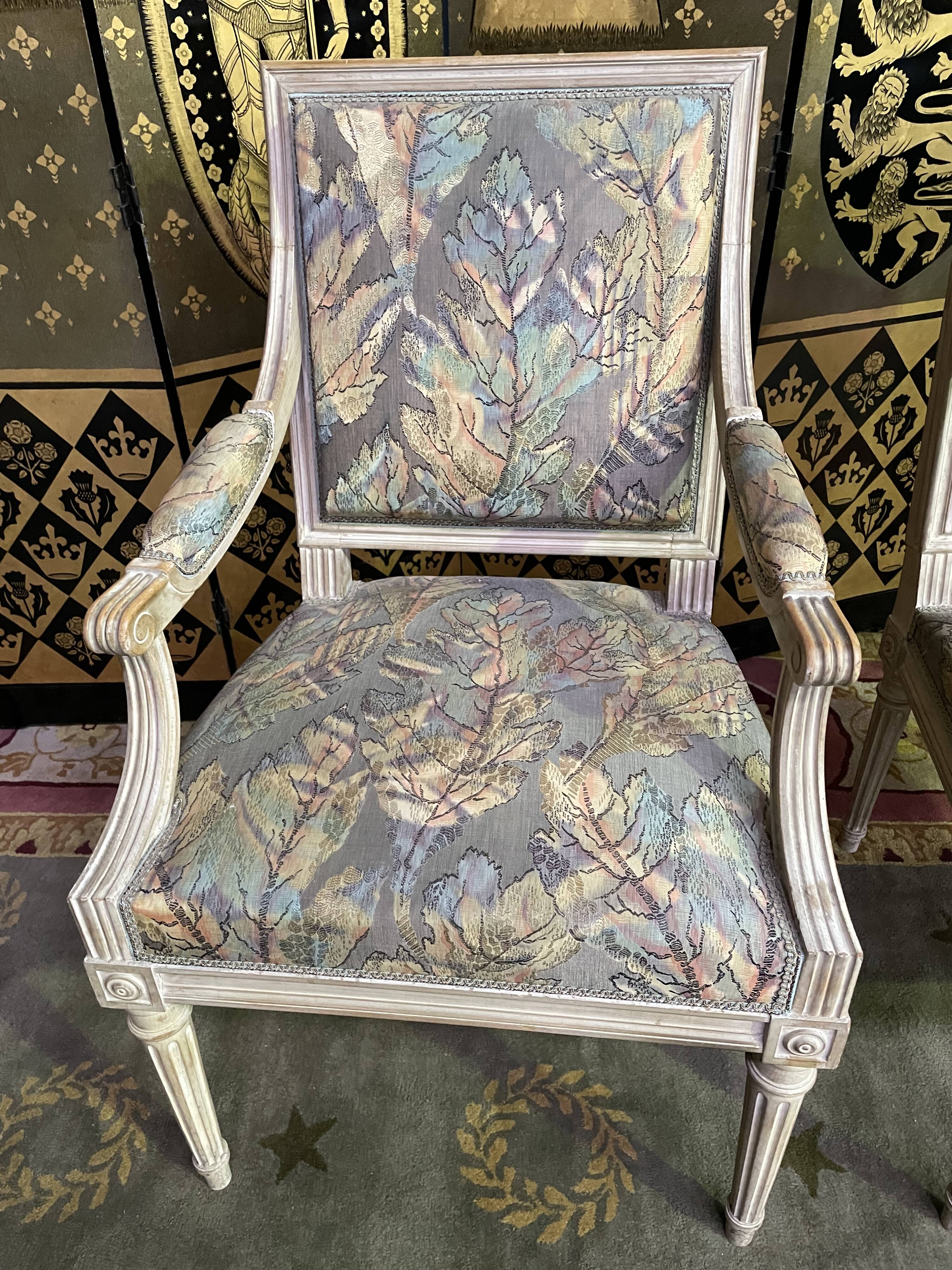 Pair of Louis XVI style convertible armchairs