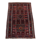 Tapis noué à la main de 308x210 cm de style oriental avec principalement des couleurs rouges.