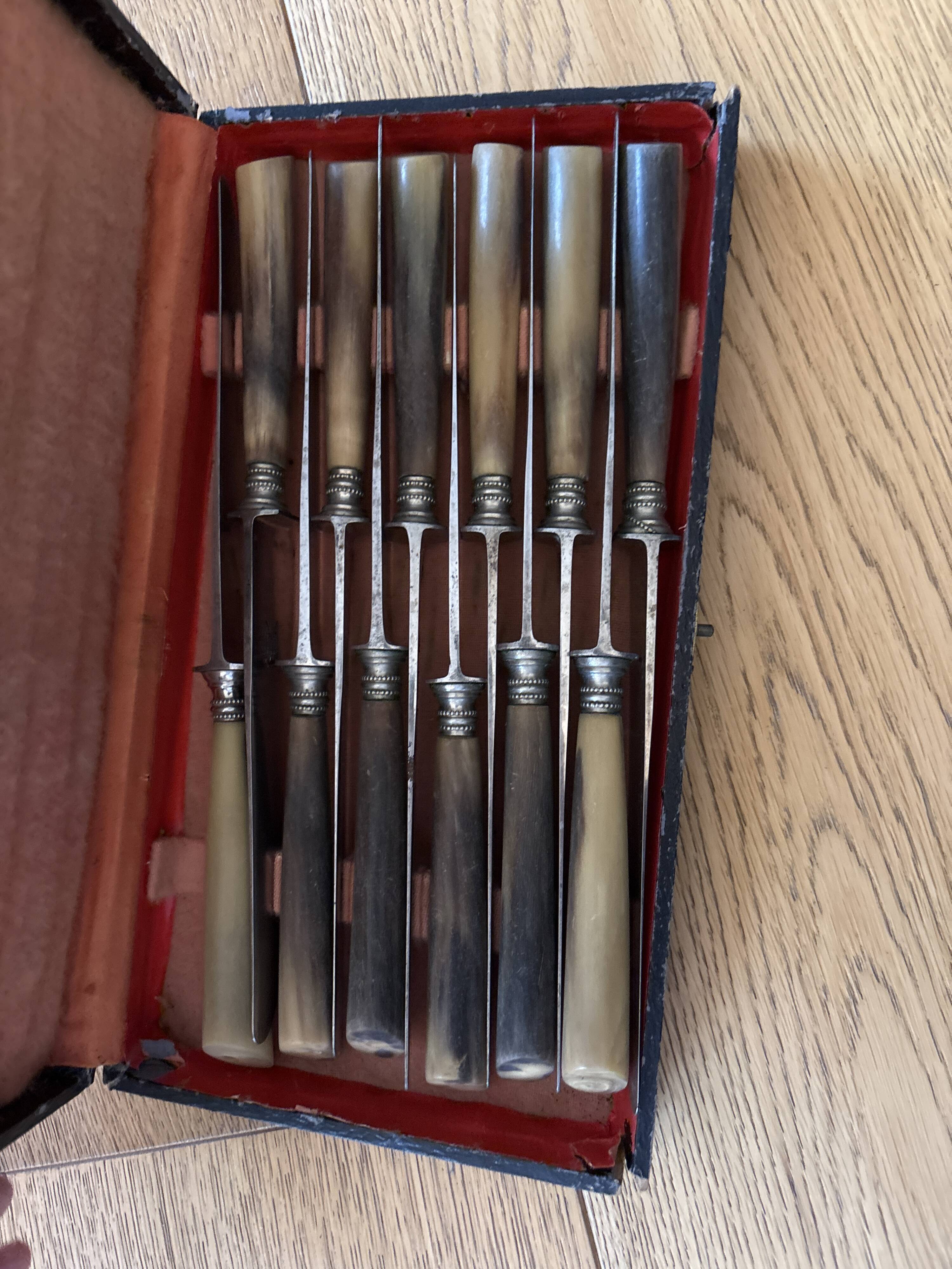 Knife with a forged steel bone handle