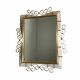 Vintage faceted mirror in an aluminium frame