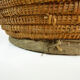 Old large bread basket of baker in braided wicker
