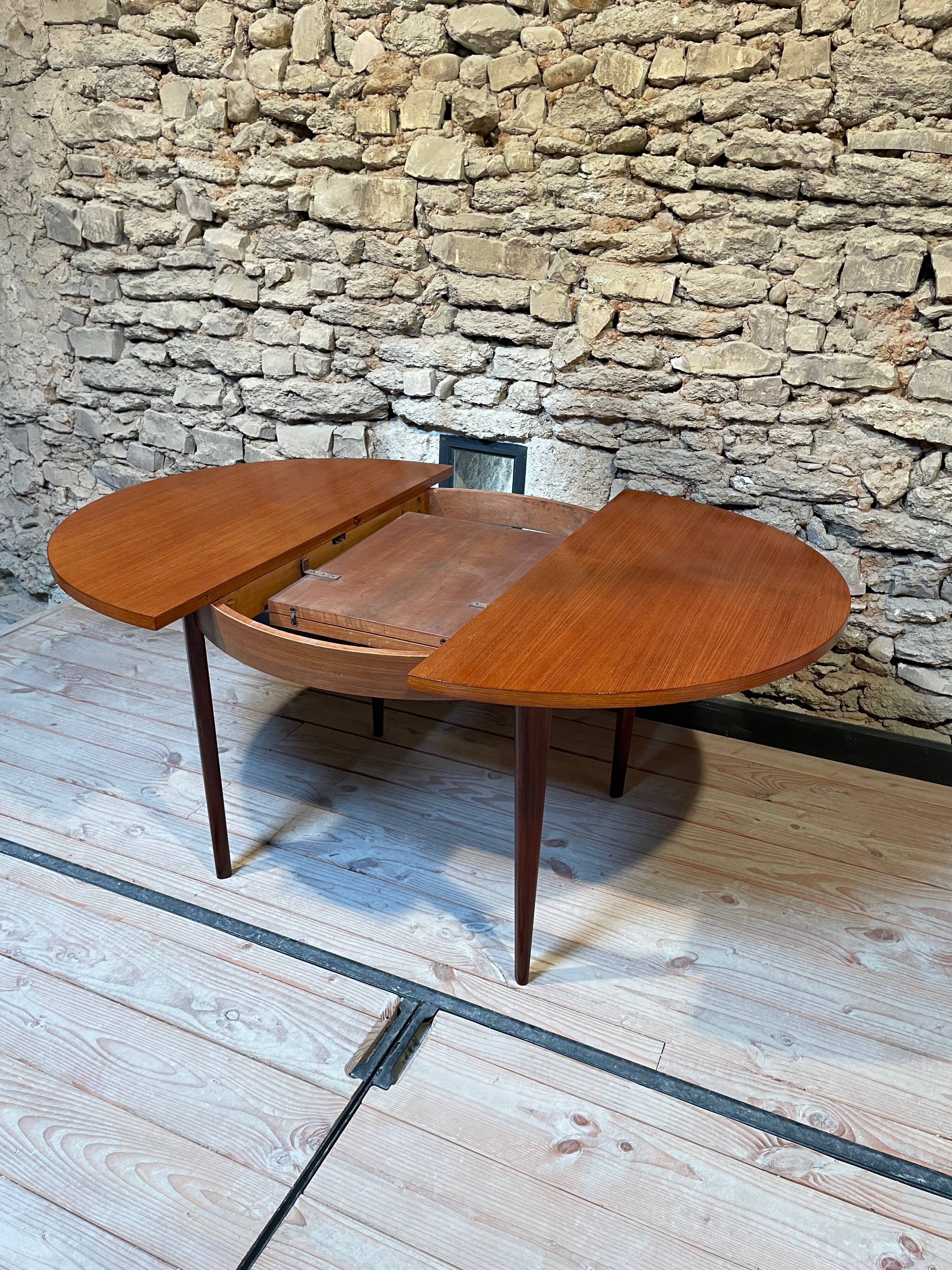 Teak table, vintage Scandinavian style from the 1960s, with hidden extension