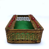 Metal and colored stone pocket emptier
