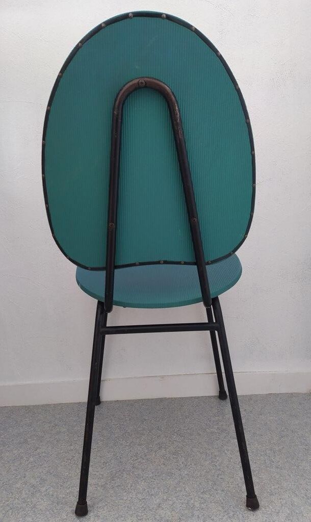 Vintage chair in turquoise green vinyl with black metal legs