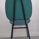 Vintage chair in turquoise green vinyl with black metal legs