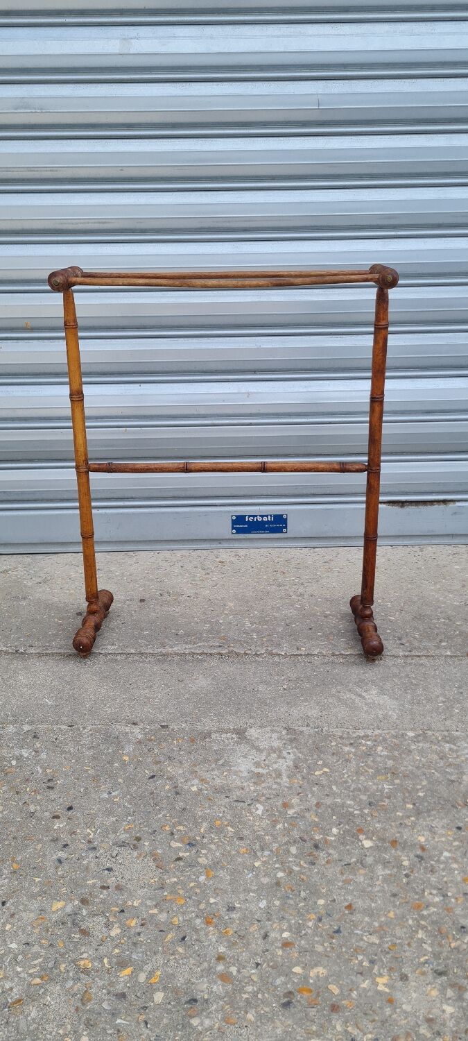 Turned wooden towel rack