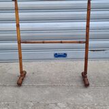 Turned wooden towel rack