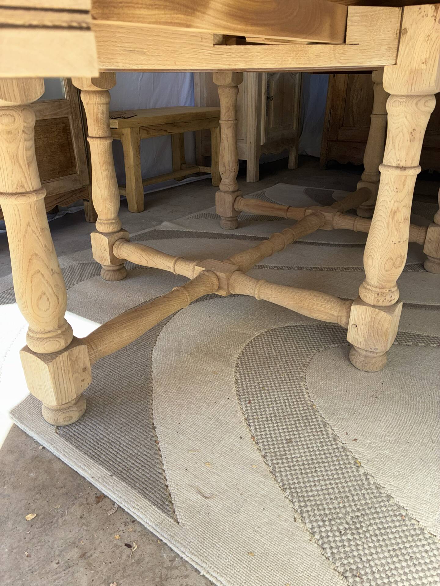 Solid oak farmhouse table with extensions.