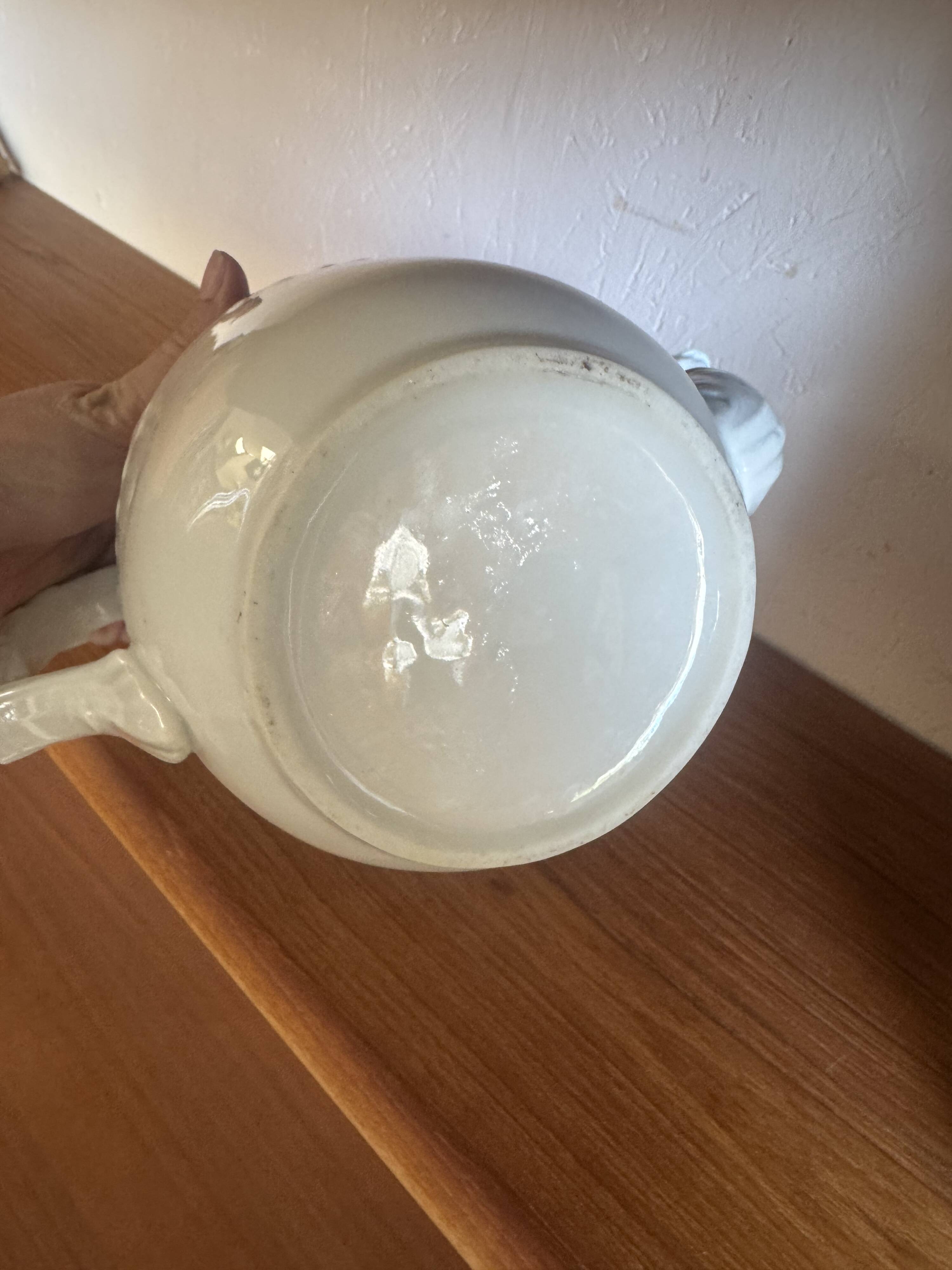 White ceramic teapot