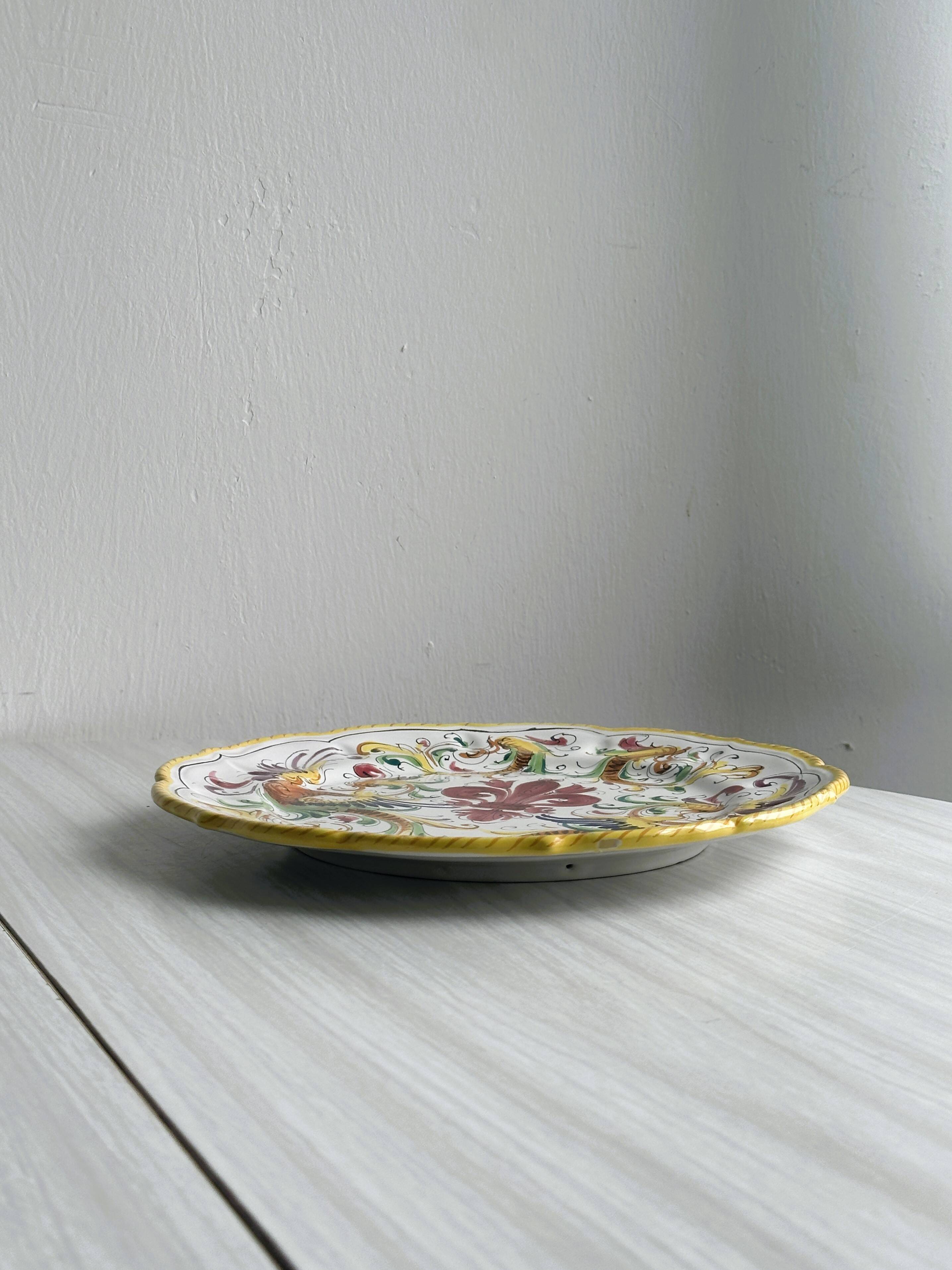 Decorative wall plate in hand-painted earthenware